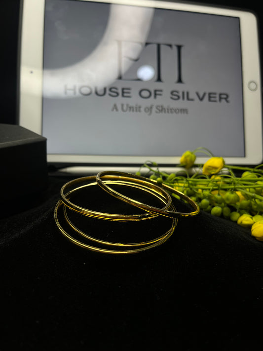 Golden Bangles - Set of Four Bangles